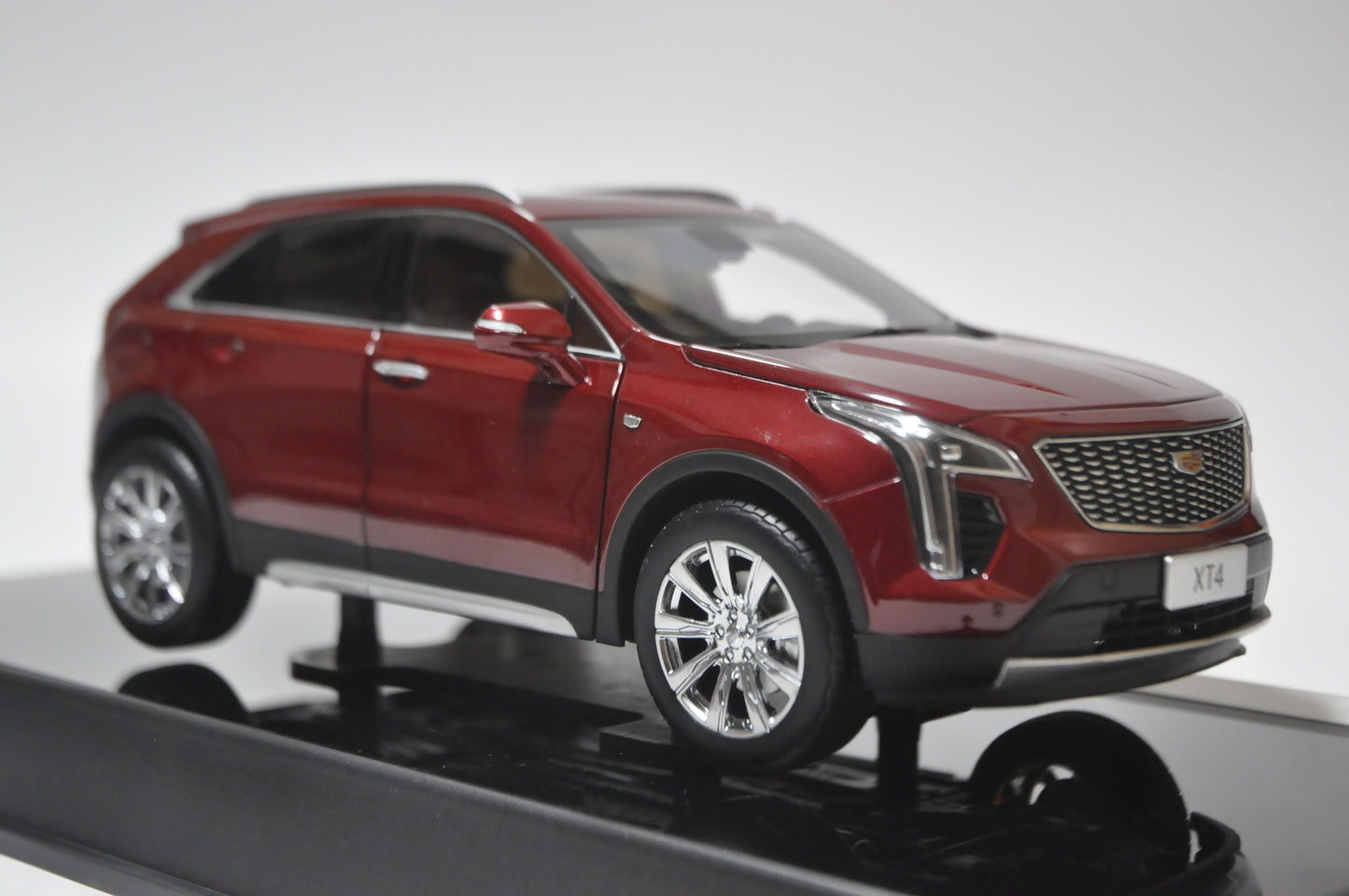 Cadillac XT4 2022 SUV Diecast model in Cherry Bomb Tint 1/18 Scale