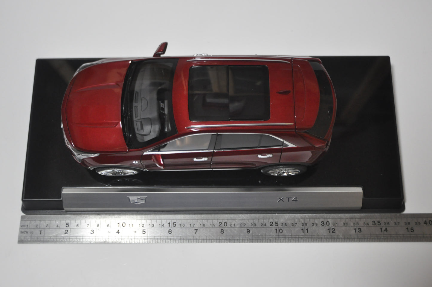 Cadillac XT4 2022 SUV Diecast model in Cherry Bomb Tint 1/18 Scale