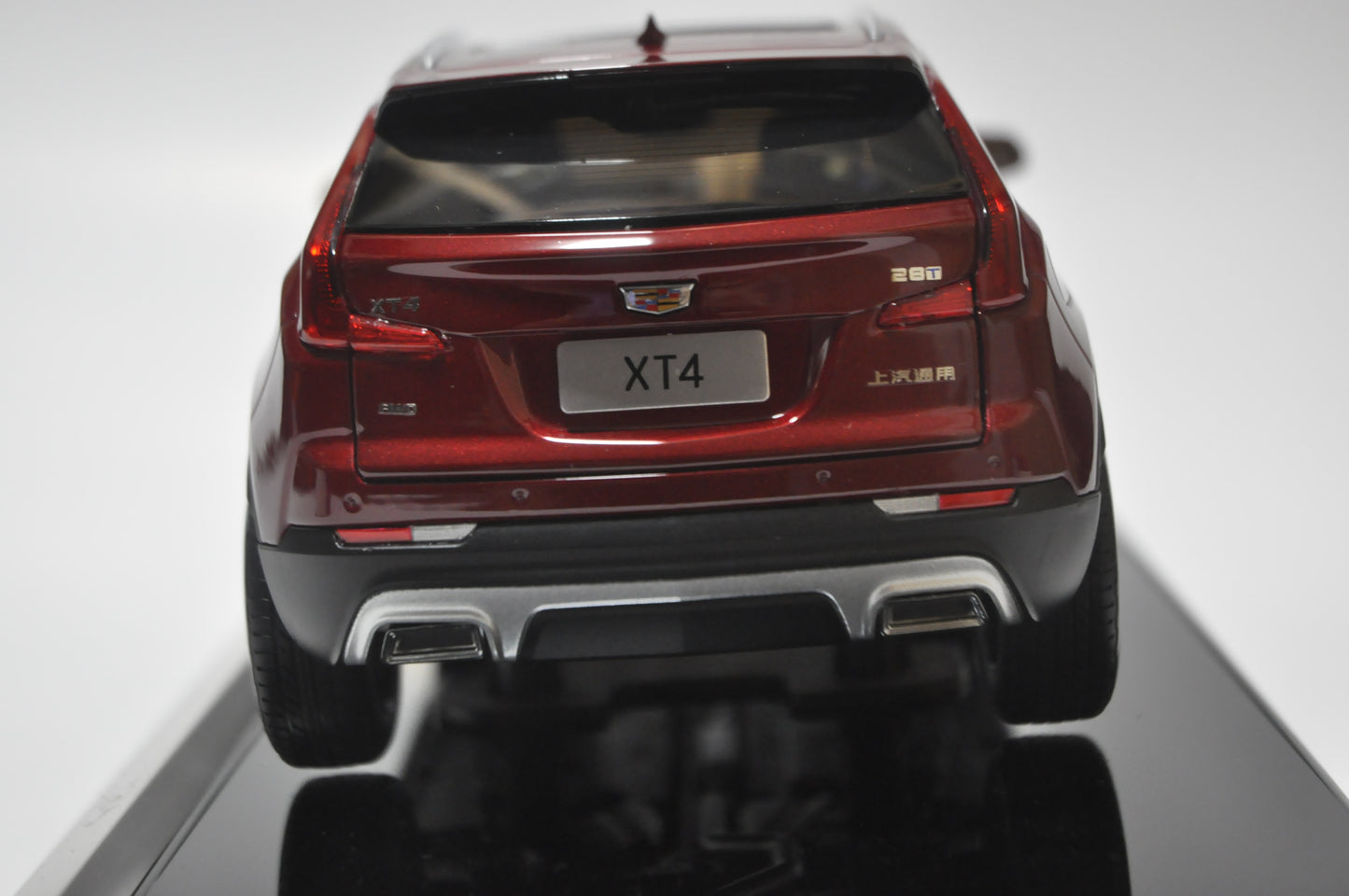 Cadillac XT4 2022 SUV Diecast model in Cherry Bomb Tint 1/18 Scale