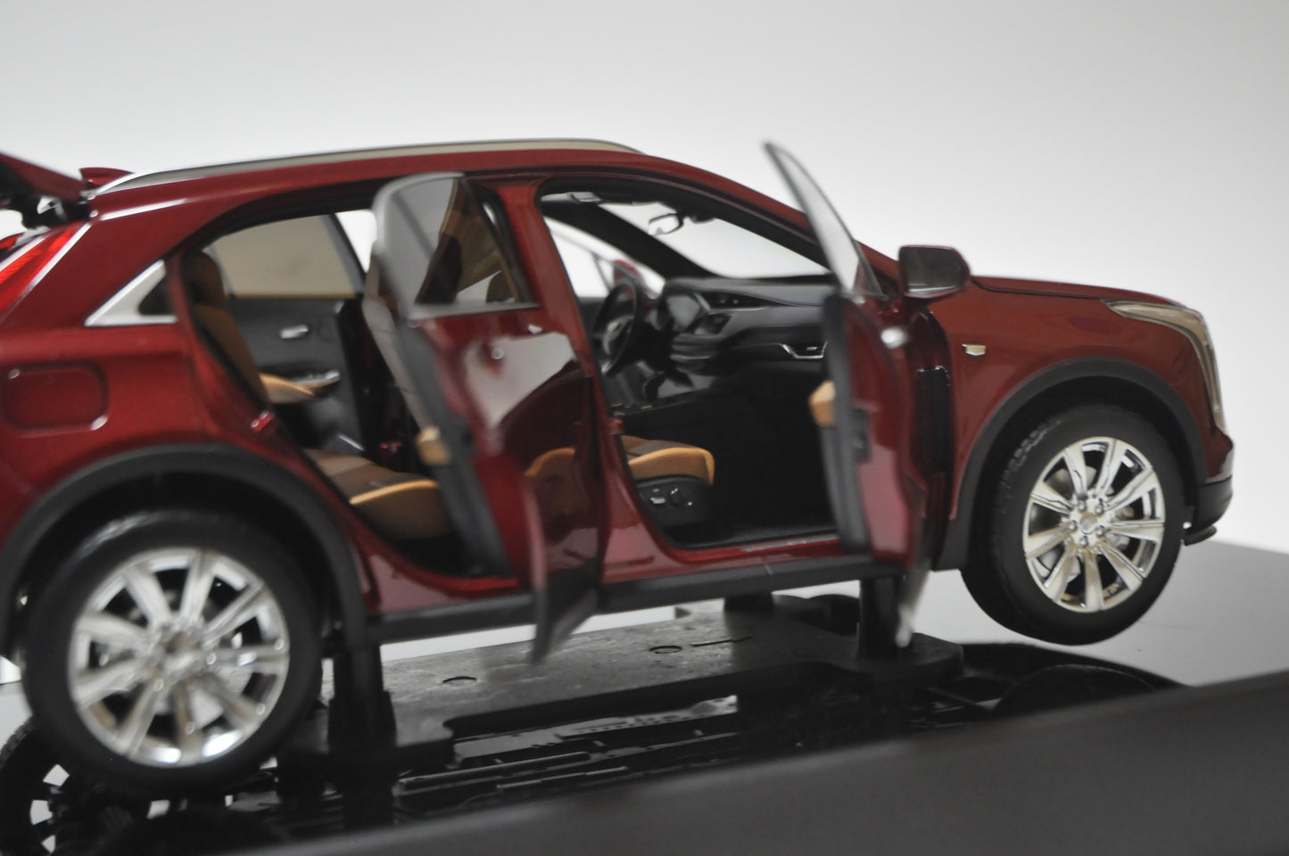 Cadillac XT4 2022 SUV Diecast model in Cherry Bomb Tint 1/18 Scale